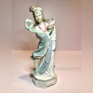 Vintage TOYO Porcelain Geisha Figurine, a hand-painted Asian Woman